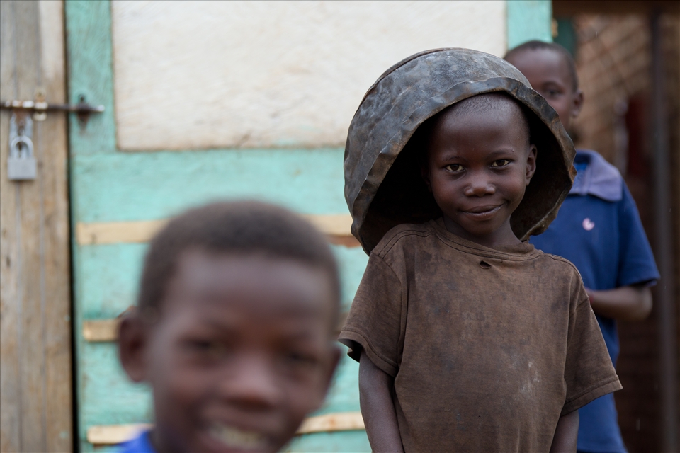 There is hope in the eyes and smiles of the children of Uganda. They are eager to learn and driven by curiosity. There is joy found in the simplest of moments and a sense of community that isn't often seen in more developed countries. These young children were playing along the road with tires and buckets, deeply immersed in their own world of make-believe. While many are in the early stages of education, they avidly yell out affectionate phrases of 