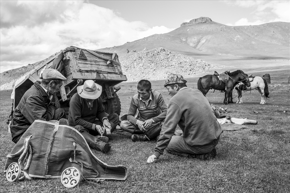 In the valley below the sacred Mandal Mountain, the horsemen take moments in the afternoon to sharpen their knives and most used tools. Their days working closely with each other builds a clear sense of comradery where they operate as a family unit.  There is rarely down time between caring for the horses and the guest they are accompanying. 