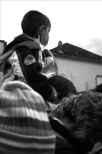 A crowd listens on as a Marian apparition visionary preaches