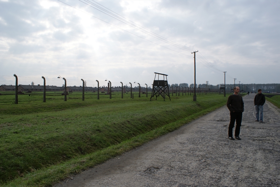 Inside, tourists wander around the gigantic open space, unsure how to behave on the ground that stood witness to history’s biggest genocide.