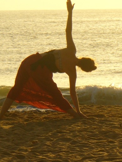 yoga on the beach at dawn, Mahabalipuram, Southern India