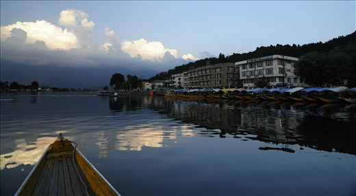 Thousands of people at Srinagar, Kashmir make a living as a boat owner or by ferrying tourists from one side to another of the beautiful Dal Lake.