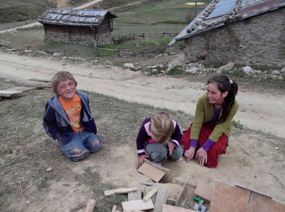 the brother of two young ladies wants to be an architect. in Uzungöl, Trabzon, Turkey.