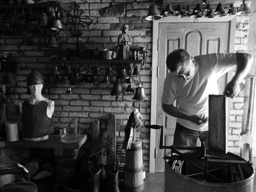 Honeycombs with open cells are put into honey extracting machine. “Some people don’t understand while I am still using this old, rusty, hand-operated honey extracting machine” says the beekeeper.  “They suggest me to buy a new, automatic apparatus to make the work easier. But beekeeping is an ancient art; by modernizing the machines, the whole process would lose its charm. And most importantly, there is nothing more meaningful than using the same machine your father once used.” 