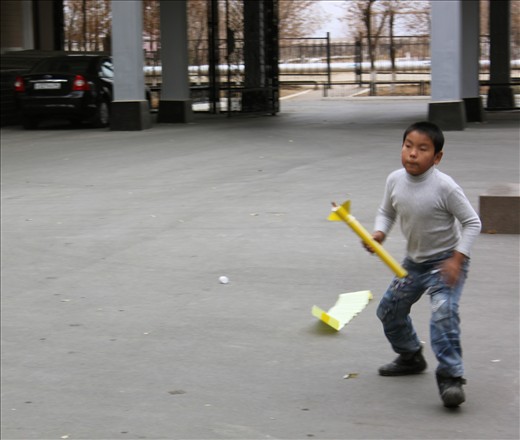 While on a tour of the International Space School, we were demonstrated the process of a rocket launch. Attendants had the opportunity to 'push the button' and launch models into air. This Kazakh boy was ready and on-the-go, collecting and playing with every rocket model that had fallen onto the launch site. 