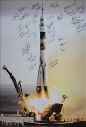 Before their journey into space, every astronaut writes his/her's name and date on the wall of the Baikonur museum, next to a image depicting a rocket launch. Another image of the sort is also in the museum, but framed becouse there was no room left for astronauts to sign. On the day of the launch, a snow storm spoiled the event for us, but I could still feel the heat coming from the rocket.: by baikonur, Views[1914]