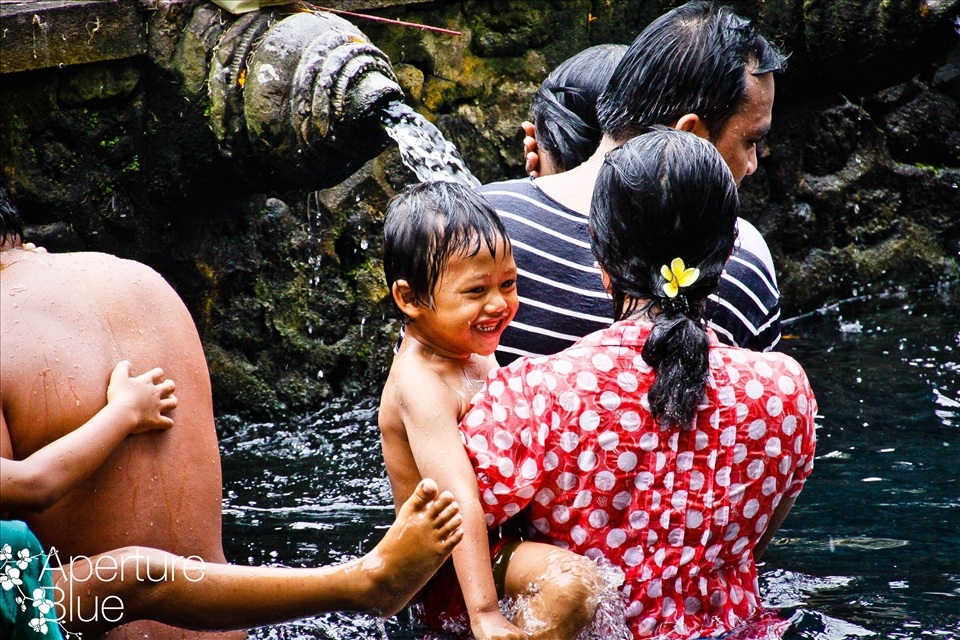 This was a Spiritual bath and there were so many people c lensing themselves, but i don't think this little boy truly understood the significance of why he was there. 