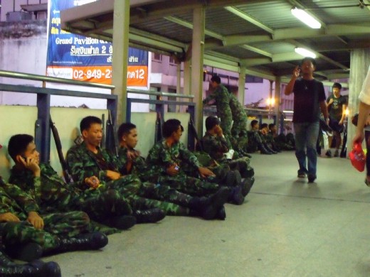 I had been at the monorail station opposite the protest site for about 3 or 4 hours. It was sunrise and commuters were going to work.  The soldiers had arrived about an hour before I did.