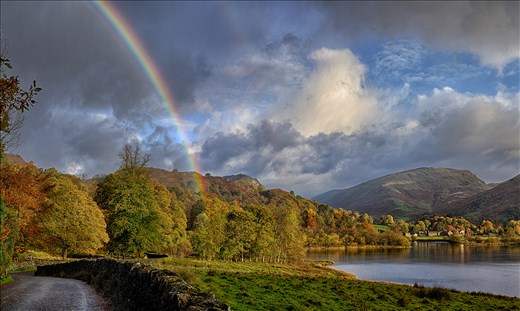 A rainbow appears after a quick rain, leading the way