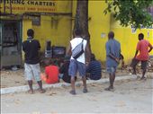 Ni-Vanuatu watching TV after work on the main street in Port Villa : by bart_australia, Views[541]