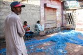 A fisherman explaining the process of creating fishing nets: by basil_andrews, Views[697]
