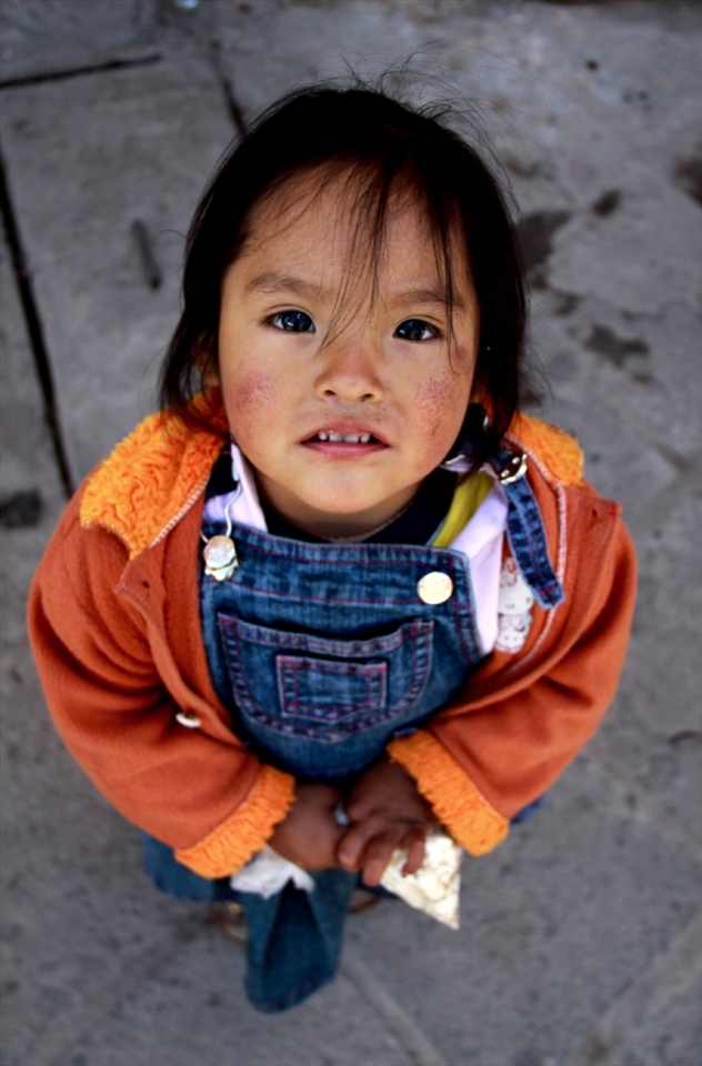 A young girl offered me popcorn just outside her mom's workplace.
