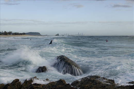Raw power and energy draws men to the surf. 
