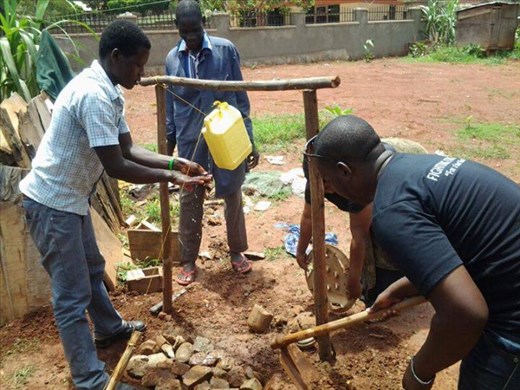 HELPING BUILD A TIPPY TAP IN ONE OF THE LOCAL COMMUNITIES IN TANZANIA