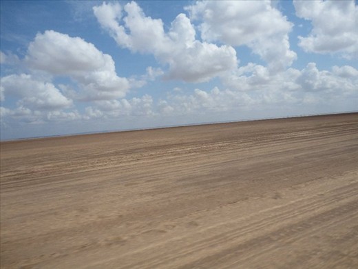 The beautiful dusty road  to the village in the middle of nowhere