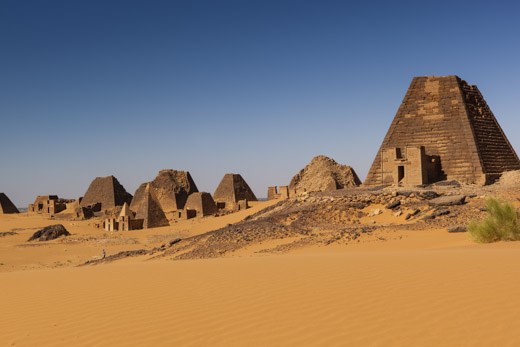 Emerging from the desert sands, the pyramids of Meroe