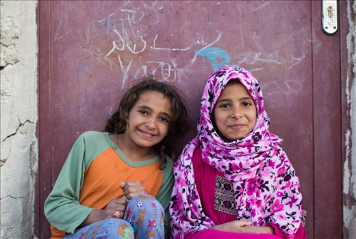 These two girls were having a chat on the street which is a rare occurance. 