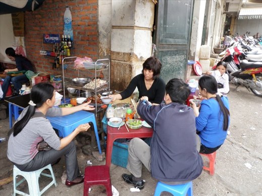 Serving up Bun cha in one of my favorite street stands in Hanoi - spring 2010