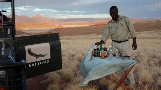 Just before sunset is known as Sundowners.  Standing on fossilised dunes watching a thunder storm cross the desert. Priceless.