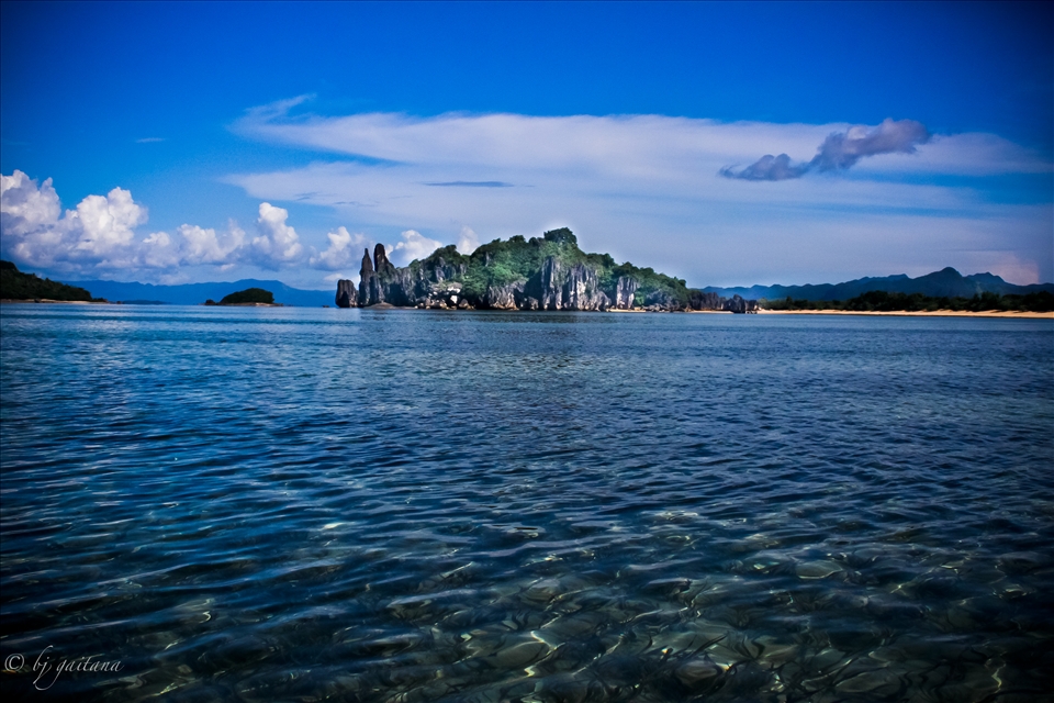 Coral island, crystal clear water
