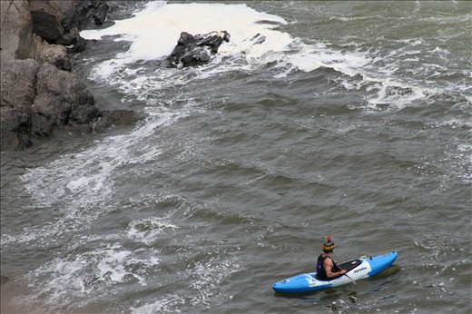 Having weathered a lot, Serge pauses, tense and defensive as his thoughts drift.