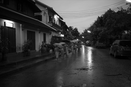 In the sacred Luang Prabang city, the monks are early as usual on a new year day