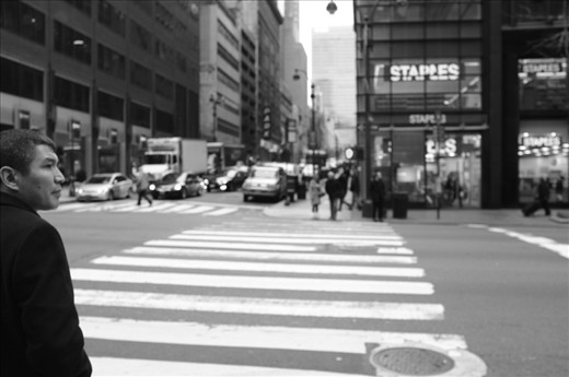Millions of rushing people are passing by each other in a daily New York routine. But there's always an individual story behind the man in a suit...

