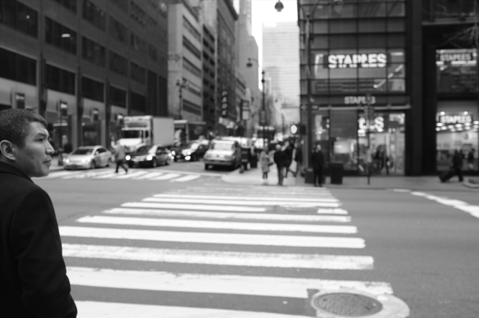 Millions of rushing people are passing by each other in a daily New York routine. But there's always an individual story behind the man in a suit...
