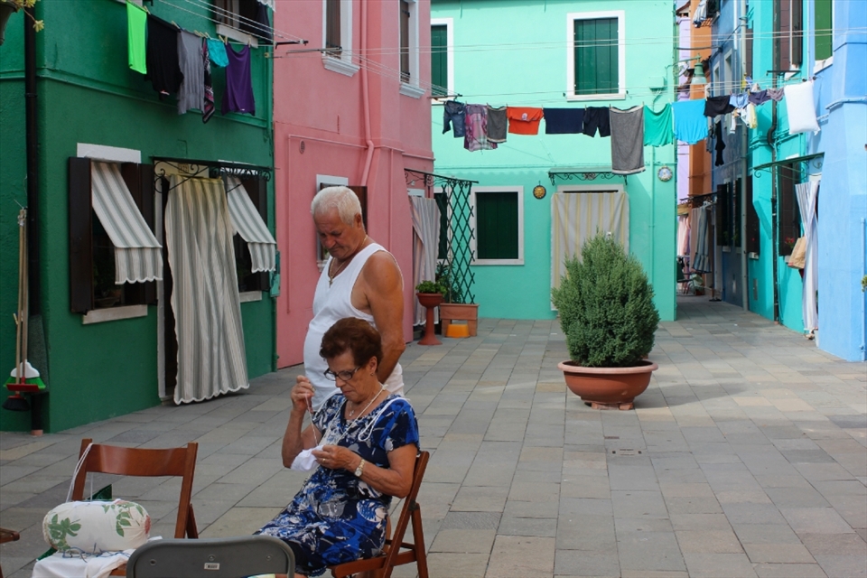 Burano is famed for its lace, mostly – though not totally – produced by women. This female resident is one of a fading generation of traditional lace makers. Laundry out to dry, she hand-weaves her latest masterpiece whilst her man oversees the production, contributing his two cents. Hmm… what is the Italian for ‘backseat driver’? 