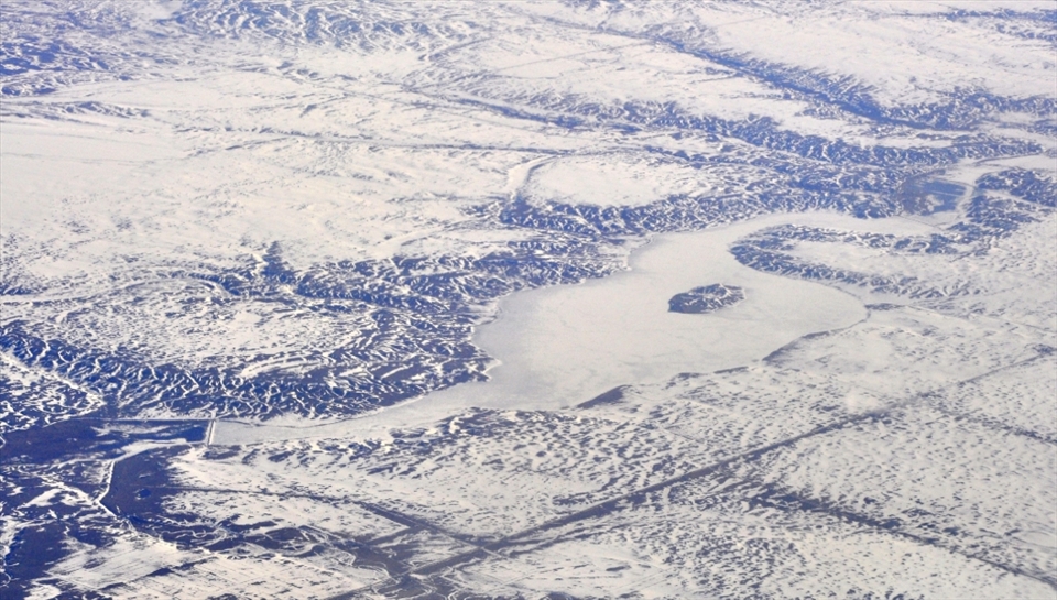 Traveling to other lands is often exciting. You get to play out your expectations of your arrival in your head, but as animated, vivid or dramatic as it may be, it never matches the sight that visits you especially looking out of the plane’s window. This aerial shot of vast Canada is one of the many scapes that prove this notion true. On a trip by airplane across Canada (east to west) you are likely to see over 5 different types of terrains and by extension ecosystem. A reminder of how environmental diversity in isolation results in beauty cumulatively