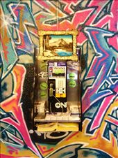 The phone in the main foyer of the hostel. To me, this picture epitomizes snowboarders. They are colourful characters, with mountains on the brain above all else, who are living abroad and constantly calling home to loved ones.: by beren, Views[721]