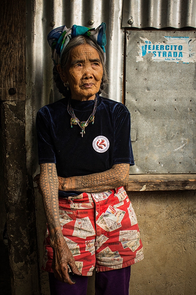 Fang-Od shows her tattoo that was given to her when she was young. Some say it was her father who tattooed her, while others say it was given by another Kalinga tattoo artist. She has become a culture bearer. Her inked skin is a living artifact that speaks stories of her tribe’s culture and history. 