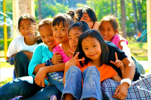 An ethnic group of young girls bonded with their friendship