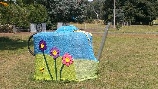 Hay bale watering can