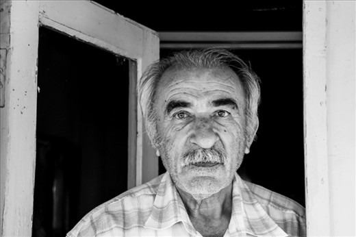 This is not a best shot technically, but sensually one of the most important pictures that I took. He is my father's uncle. He is the greatest lover of nature and  human kind and in love with Beybağı and this family deeply. But he looks exhausted and misses the old days maybe, that's what i tried to capture at the door of his mother's house.
