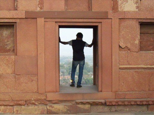 a guy who is trap between wall, he is seeing the outer world from his eyes, but inside he is trap by heart like this wall