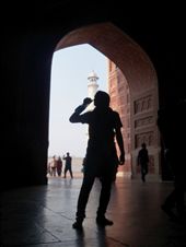 silhouette of man drinking water, standing between the gate.: by beyondimagination, Views[778]
