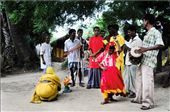 Villagers make an image of her and sing and dance before it throughout the month