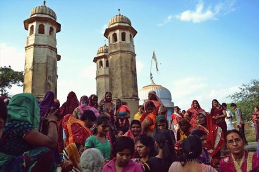  under that covered piece of cloth is the gangaur which this girl had worshiped 