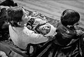 A mother holds her disabled child at the Chingari Trust, a local aid org: by bhopal, Views[557]