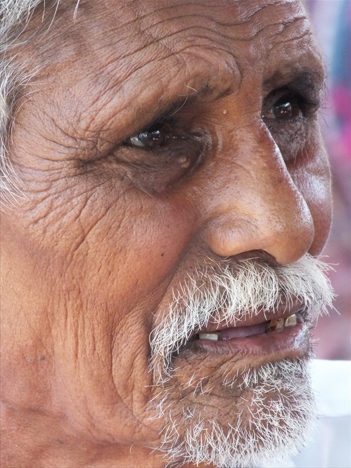 A poverty stricken man, battered with concern to survive