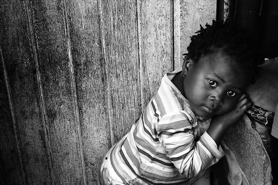 Whilst walking the streets of Soweto, people were welcoming us into their homes even though they did not know us, it was really amazing. We were invited into a shack by a mother, her children were so shy, but I was lucky to snap this pic of her daughter. 
