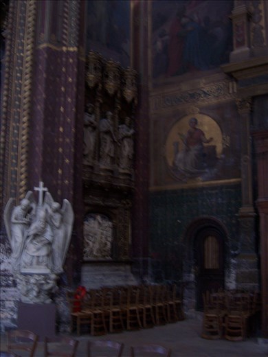Paris -- St Eustache -- side chapel with statues, painted walls and door