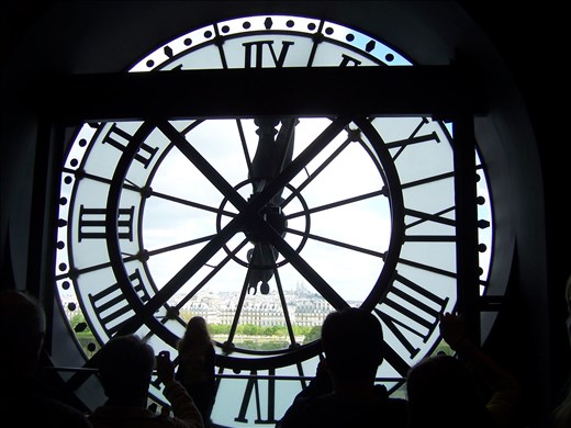 Paris -- Musee d'Orsay -- exterior clock inside view w/Sacre Couer in background