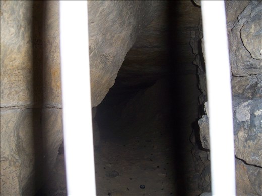 Paris -- Catacombs -- gated tunnel to the underworld