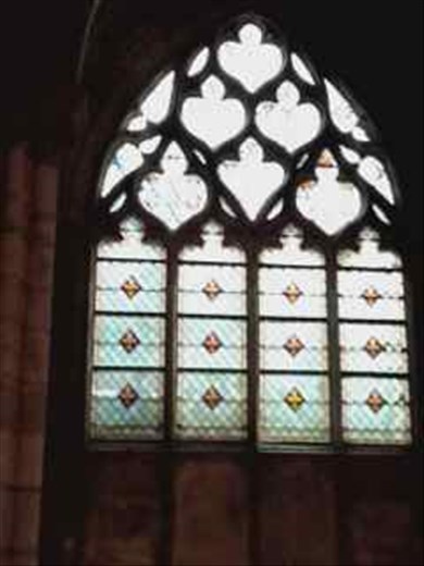 Paris -- Basilique de St Denis -- fleur de lis stained glass -- sign of royalty