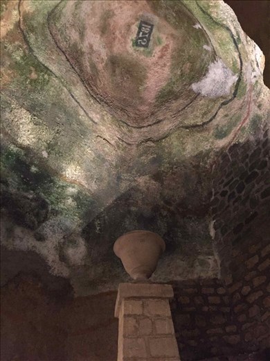 Paris -- Catacombs -- dissolving domed roof of limestone tunnel 