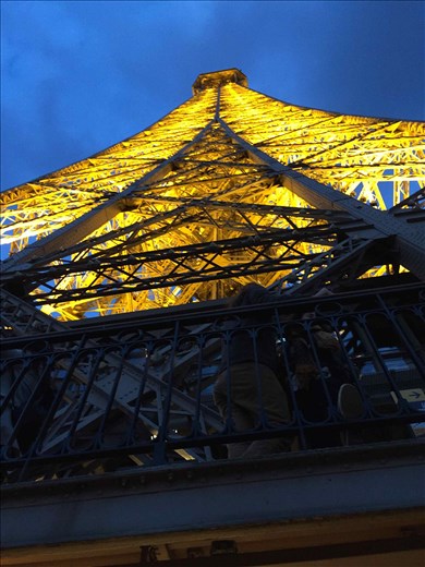 Paris -- Eiffel Tower -- looking up -- lighted tower at night