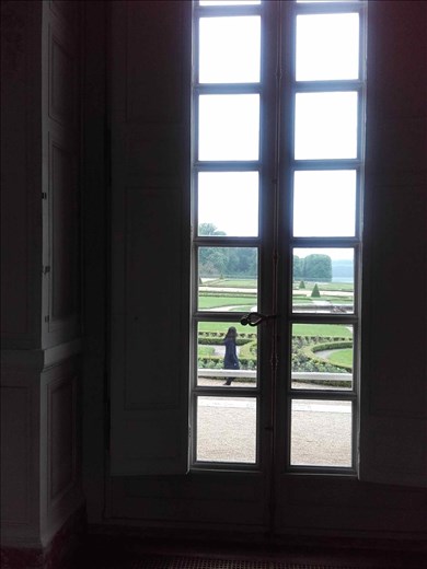 Versailles -- view looking out window tom Hall of Mirrors