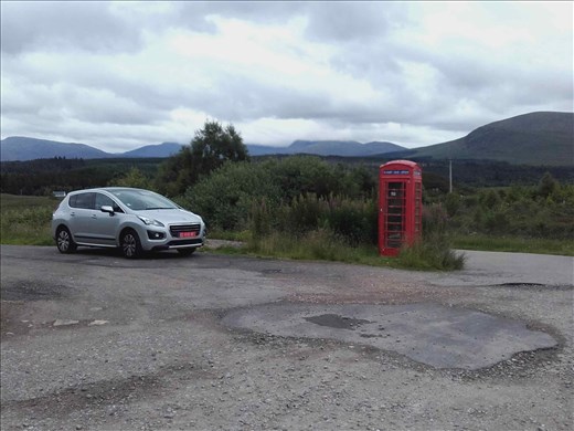 Northwest rural Scotland -- abandoned metal phone booth.01